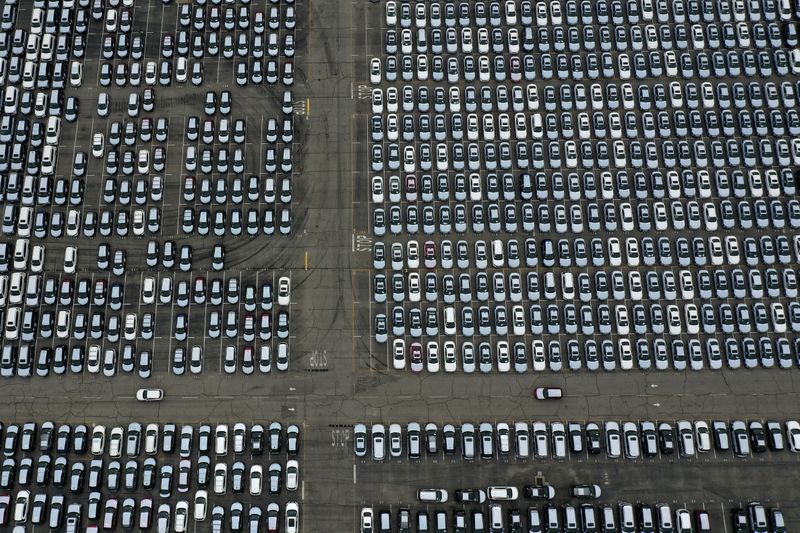 &copy; Reuters. FILE PHOTO: New cars are seen lined up next to the dock as the global outbreak of the coronavirus disease (COVID-19) continues, at the Port of Los Angeles, California, U.S., April 29, 2020.  REUTERS/Lucy Nicholson