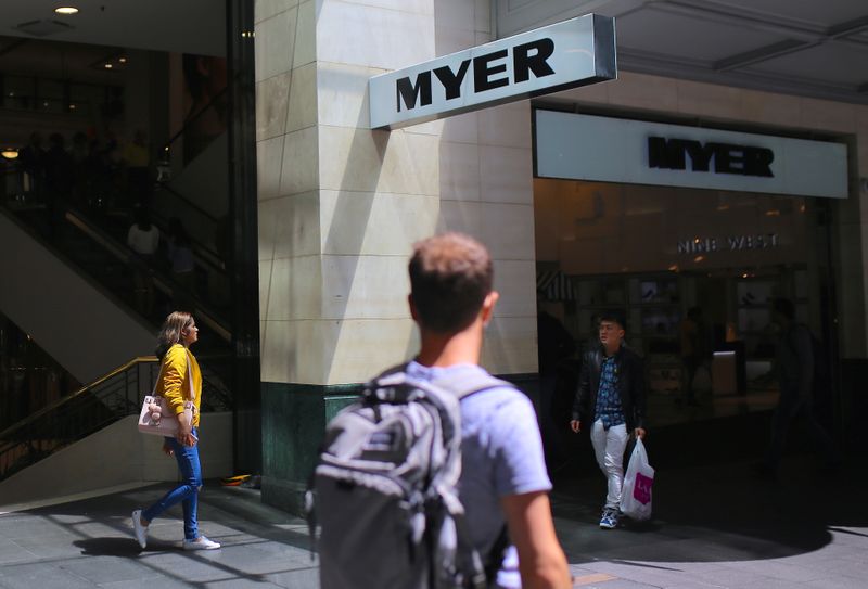 &copy; Reuters. Shoppers walk past an entrance to a Myer department store, owned by Australia's biggest department store chain Myer Holdings Ltd, in Sydney, Australia, November 1, 2017.  REUTERS/Steven Saphore/Files