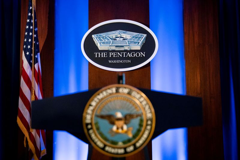 © Reuters. FILE PHOTO: The Pentagon logo is seen behind the podium in the briefing room at the Pentagon in Arlington, Virginia, U.S., January 8, 2020. REUTERS/Al Drago/File Photo