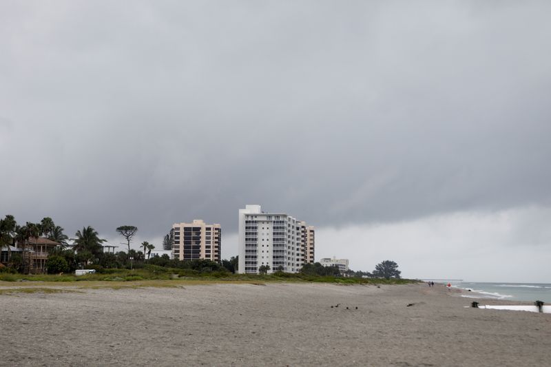 &copy; Reuters. Dark clouds are looming over the horizon as Tropical Storm Elsa churns slowly up the Gulf Coast at Venice Beach, Florida, U.S.  July 6, 2021. REUTERS/Octavio Jones