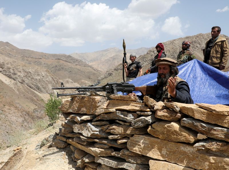 &copy; Reuters. FILE PHOTO: Armed men who are against Taliban uprising stand at their check post, at the Ghorband District, Parwan Province, Afghanistan June 29, 2021. REUTERS/Omar Sobhani/File Photo