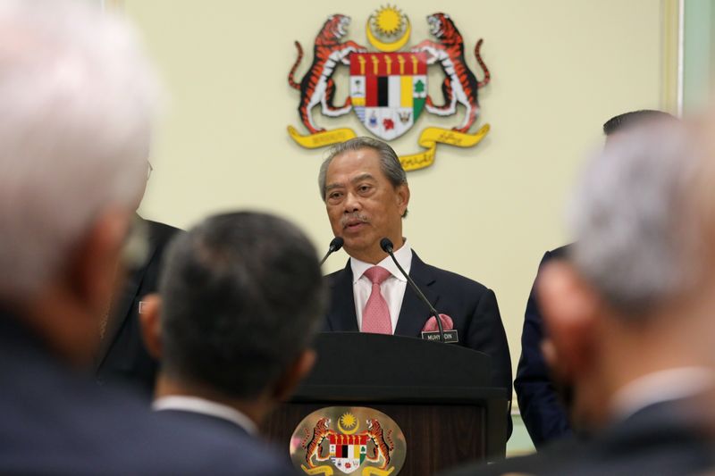 &copy; Reuters. FILE PHOTO: Malaysia's Prime Minister Muhyiddin Yassin speaks during a news conference in Putrajaya, Malaysia March 11, 2020. REUTERS/Lim Huey Teng