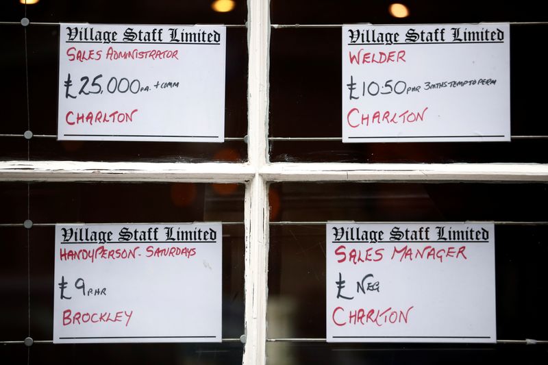 &copy; Reuters. FILE PHOTO: Adverts are seen in the window of a job agency in London, Britain October 13, 2020. REUTERS/Hannah McKay