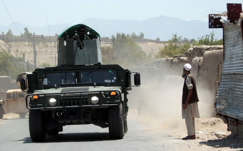 Taliban fighters capture key Afghan border crossing with Iran