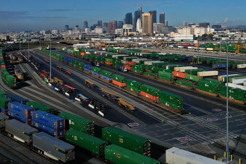 &copy; Reuters. FILE PHOTO: Shipping containers sit on train tracks downtown as the spread of the coronavirus disease (COVID-19) continues, in Los Angeles, California, U.S., April 7, 2020.  REUTERS/Lucy Nicholson