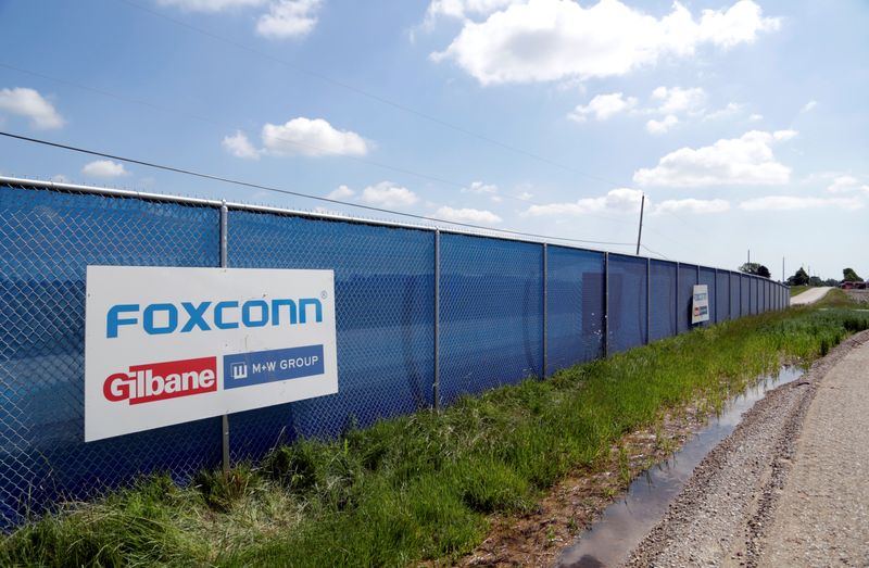 &copy; Reuters. A FoxConn logo is seen before the arrival of U.S. President Donald Trump as he participates in the Foxconn Technology Group groundbreaking ceremony for its LCD manufacturing campus, in Mount Pleasant, Wisconsin, U.S., June 28, 2018.  REUTERS/Darren Hauck/