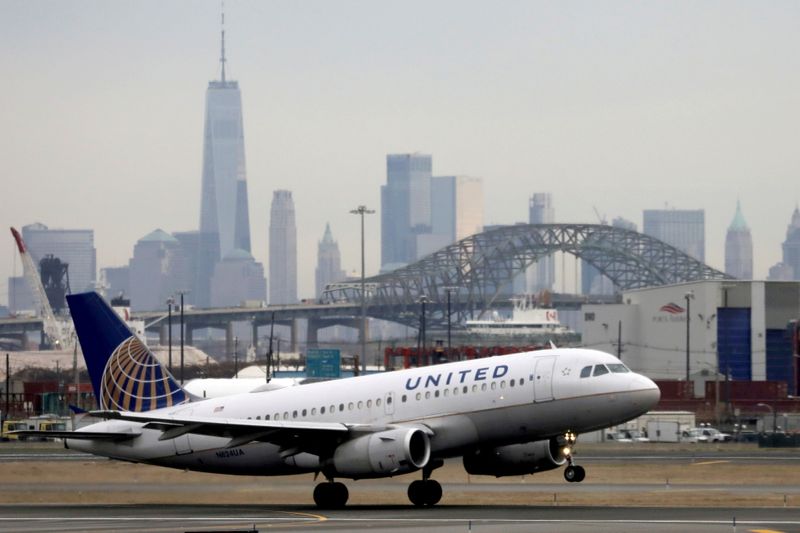 &copy; Reuters. FILE PHOTO: A United Airlines passenger jet takes off with New York City as a backdrop, at Newark Liberty International Airport, New Jersey, U.S. December 6, 2019. REUTERS/Chris Helgren
