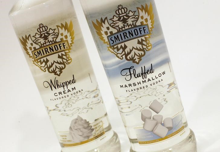 &copy; Reuters. Bottles of Diageo's Smirnoff Whipped Cream (L) and Fluffed Marshmallow flavored vodkas which were recently launched in the U.S. are seen in this picture taken December 20, 2011. Vodkas flavored with citrus and berry have been around for years and recently