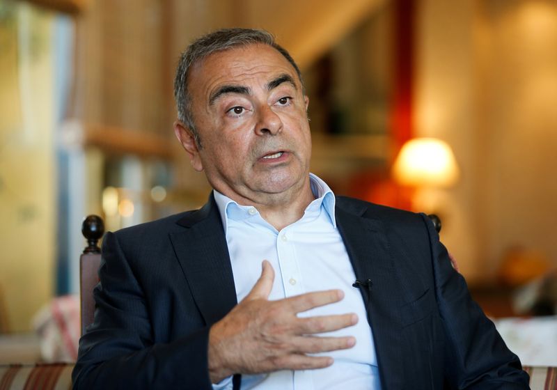 &copy; Reuters. FILE PHOTO: Fugitive former car executive Carlos Ghosn, gestures as he talks during an interview with Reuters in Beirut, Lebanon June 14, 2021. REUTERS/Mohamed Azakir