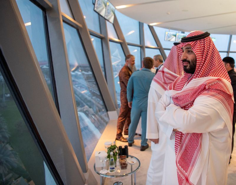 &copy; Reuters. FILE PHOTO: Saudi Crown Prince Mohammed bin Salman is seen during the Emirates Formula One Grand Prix at the Yas Marina racetrack in Abu Dhabi, United Arab Emirates November 25, 2018. Bandar Algaloud/Courtesy of Saudi Royal Court/Handout via REUTERS