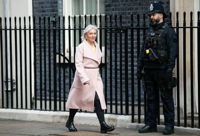© Reuters. نادين دوريس وزيرة الدولة لشؤون الثقافة والإعلام والرياضة في بريطانيا خارج مقر الحكومة في لندن يوم الثلاثاء. تصوير: بيتر نيكولاس-رويترز.