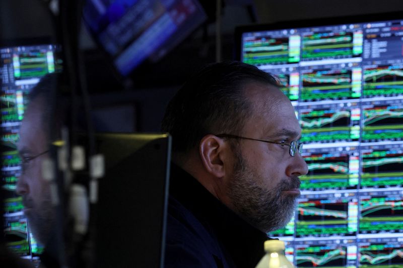 &copy; Reuters. A specialist trader works inside his post on the floor of the New York Stock Exchange (NYSE) in New York City, U.S., March 10, 2022.  REUTERS/Brendan McDermid