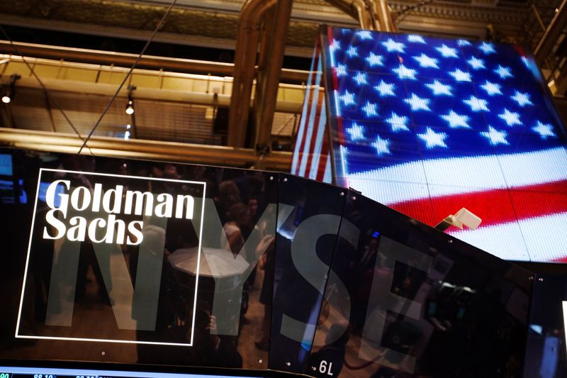 © Reuters. FILE PHOTO: The Goldman Sachs logo is displayed on a post above the floor of the New York Stock Exchange, September 11, 2013. REUTERS/Lucas Jackson/File Photo