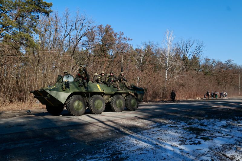 &copy; Reuters. Members of the Ukrainian forces sit on a military vehicle amid Russia's invasion of Ukraine, in the Vyshgorod region near Kyiv, Ukraine March 10, 2022.  REUTERS/Serhii Nuzhnenko