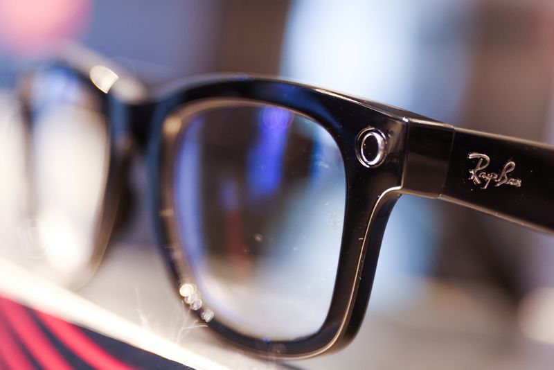 &copy; Reuters. FILE PHOTO: A Ray-Ban sunglass frame is pictured for sale in a Sunglass Hut, both brands owned by EssilorLuxottica SA, in Manhattan, New York City, U.S., November 30, 2021. REUTERS/Andrew Kelly