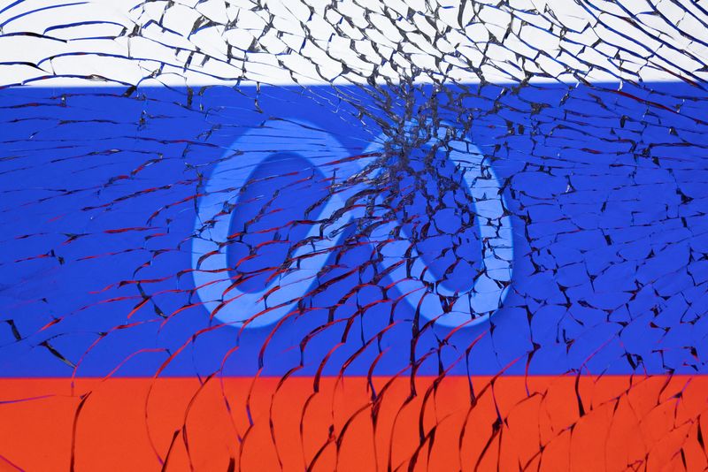 &copy; Reuters. FILE PHOTO: Meta logo and Russian flag are seen through broken glass in this illustration taken March 1, 2022. REUTERS/Dado Ruvic/Illustration
