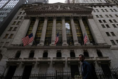 Wall Street slumps in broad swoon to end bumpy week By Reuters