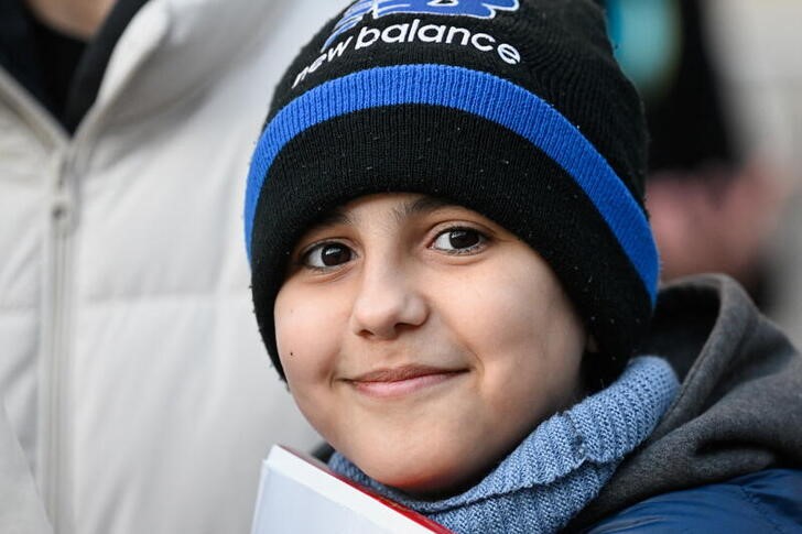 &copy; Reuters. Foto del viernes de Hassan Alkhalaf, de 11 años y que escapó desde Ucrania, en una manifestación en Bratislava
Mar 11, 2022. REUTERS/Radovan Stoklasa