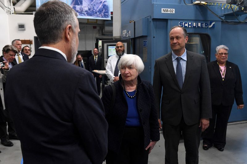 &copy; Reuters. Superintendent of the Denver Mint Randy Johnson speaks to U.S. Secretary of the Treasury Janet Yellen and U.S. Second Gentleman Douglas Emhoff during a tour of the Denver Mint, one of the two locations that manufactures coins for the new American Women Qu