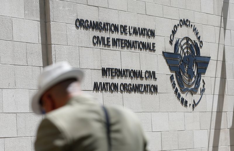 &copy; Reuters. A man eats lunch outside the International Civil Aviation Organization (ICAO) headquarters building is in Montreal, Quebec, Canada June 15, 2017.  REUTERS/Christinne Muschi