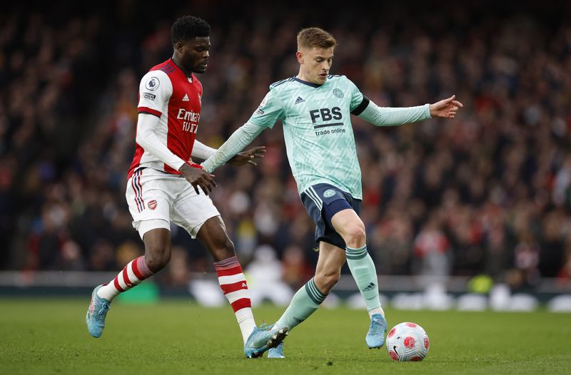 &copy; Reuters. Soccer Football - Premier League - Arsenal v Leicester City - Emirates Stadium, London, Britain - March 13, 2022 Arsenal's Thomas Partey in action with Leicester City's Harvey Barnes Action Images via Reuters/John Sibley 