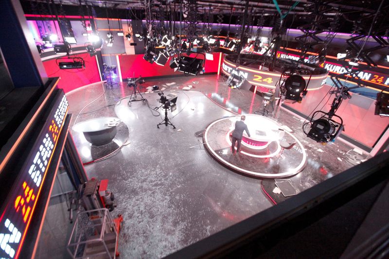 © Reuters. View of the damaged studio at the Kurdistan 24 TV building after a ballistic missiles attack nearby in Erbil, Iraq March 13, 2022. REUTERS/Azad Lashkari