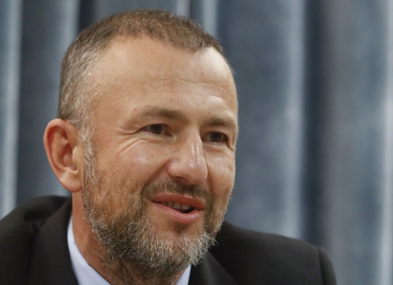 &copy; Reuters. FILE PHOTO: Andrei Melnichenko, major shareholder of Siberian Coal Energy Company (SUEK) and Siberian Generating Company, attends an agreement signing ceremony with the Krasnoyarsk region's government, in Moscow, Russia December 12, 2017. REUTERS/Sergei K