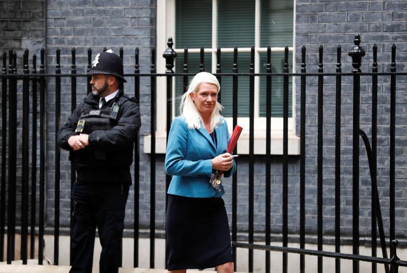 &copy; Reuters. FILE PHOTO: Britain's Minister without Portfolio Amanda Milling walks outside Downing Street in London, Britain, September 14, 2021. REUTERS/Peter Nicholls