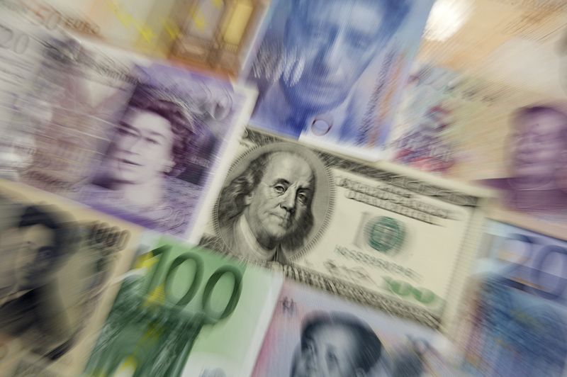 &copy; Reuters. Arrangement of various world currencies including Chinese Yuan, Japanese Yen, US Dollar, Euro, British Pound, Swiss Franc are pictured in Warsaw January 26, 2011. REUTERS/Kacper Pempel/Files