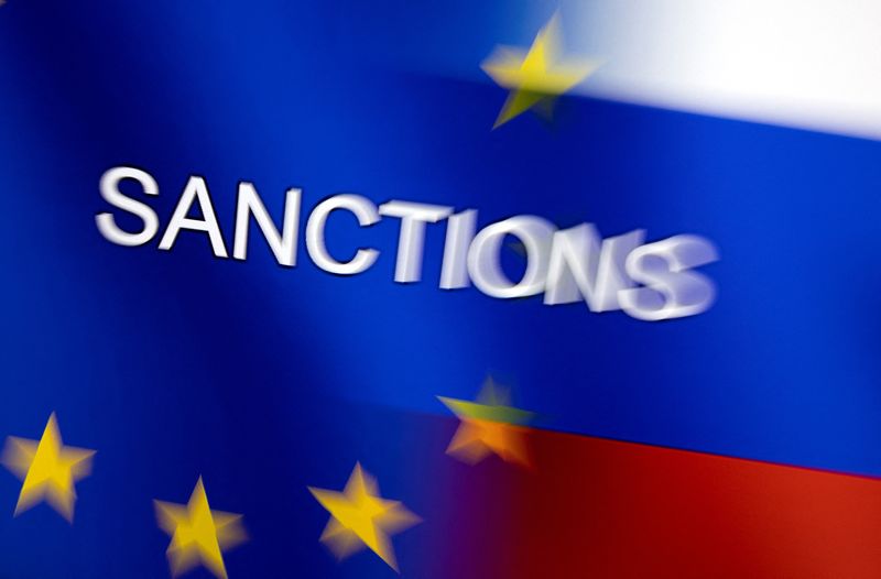 &copy; Reuters. Word "Sanctions" is displayed on EU and Russian flags in this illustration taken, February 27, 2022. REUTERS/Dado Ruvic/Illustration