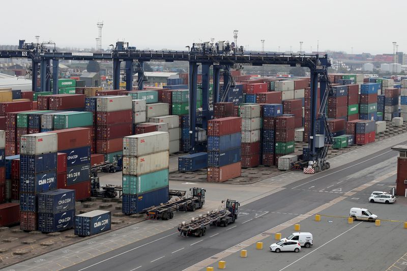 &copy; Reuters. FILE PHOTO: A general view of shipping containers seen from the bridge of the AAL Kobe cargo ship docked at Felixstowe Port, Britain April 16, 2019. REUTERS/Chris Radburn