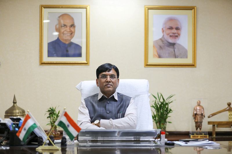 &copy; Reuters. FILE PHOTO: Shipping Minister Mansukh Mandaviya poses for a picture after his interview with Reuters, at his office, in New Delhi, India, March 4, 2021. REUTERS/Anushree Fadnavis