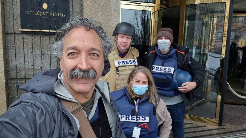 © Reuters. Fox News cameraman Pierre Zakrzewski, who was killed in Ukraine after the vehicle in which he was traveling was struck by incoming fire, poses for a selfie with colleagues Steve Harrigan, Yonat Frilling and Ibrahim Hazboun in Kyiv, Ukraine in an undated photograph. FOX News Sunday/Handout via REUTERS