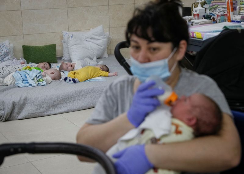 Nurse cares for surrogate children in Kyiv as war stops her seeing her own
