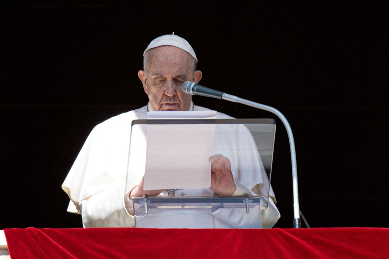 &copy; Reuters. FILE PHOTO: Pope Francis leads the Angelus prayer from the window of the Apostolic Palace at the Vatican, March 13, 2022. Vatican Media/­Handout via REUTERS   