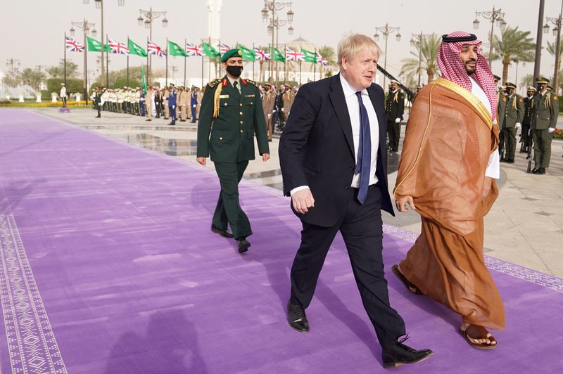 &copy; Reuters. British Prime Minister Boris Johnson is welcomed by Saudi Crown Prince, Mohammed bin Salman, ahead of a meeting at the Royal Court, during a one-day visit to Saudi Arabia and United Arab Emirates, following Russia's invasion of Ukraine, in Riyadh, Saudi A