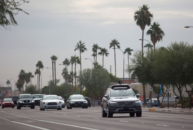&copy; Reuters. FILE PHOTO: A self driving Volvo vehicle moves along the streets of Scottsdale, Arizona, U.S., December 1, 2017. REUTERS/Natalie Behring/File Photo