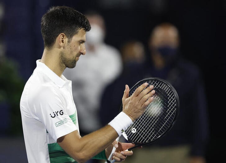 &copy; Reuters. Tennis - ATP 500 - Dubai Tennis Championships - The Dubai Duty Free Tennis Centre, Dubai, United Arab Emirates - February 24, 2022 Serbia's Novak Djokovic looks dejected after he loses his quarter final match against Czech Republic's Jiri Vesely REUTERS/S