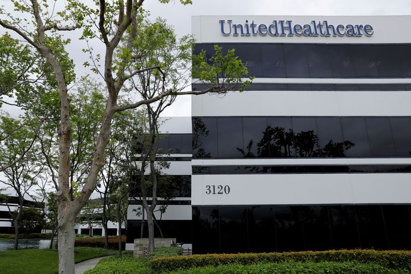 &copy; Reuters. FILE PHOTO: The corporate logo of the UnitedHealth Group appears on the side of one of their office buildings in Santa Ana, California, U.S., April 13, 2020.      REUTERS/Mike Blake