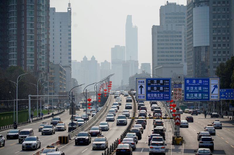 &copy; Reuters. FILE PHOTO - A main street is seen decorated for Lunar New Year celebrations following an outbreak of the coronavirus disease (COVID-19) in Wuhan, Hubei province, China February 8, 2021. REUTERS/Aly Song