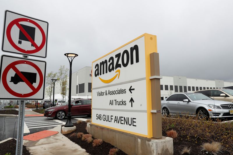 &copy; Reuters. An Amazon sign stands in a parking lot outside of an Amazon warehouse as the outbreak of the coronavirus disease (COVID-19) continues in the Staten Island borough of New York U.S., May 1, 2020. REUTERS/Lucas Jackson