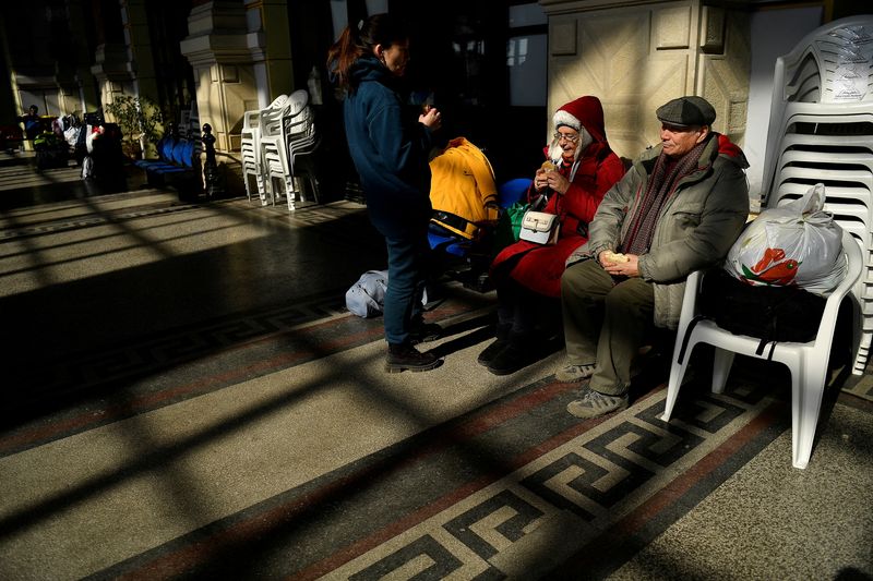 &copy; Reuters. Un corridor humanitaire sera ouvert samedi matin à 9 heures dans la région de Louhansk, a annoncé le gouverneur Serhiy Gaiday sur Telegram. /Photo prise le 14 mars 2022/REUTERS/Clodagh Kilcoyne