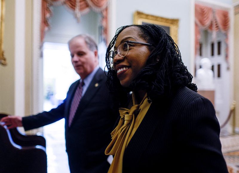&copy; Reuters. FILE PHOTO: Supreme Court nominee and federal appeals court Judge Ketanji Brown Jackson departs with her White House escort and advisor, former U.S. Senator Doug Jones (D-AL), after meeting with U.S. Senate Minority Leader Mitch McConnell (R-KY) in the U.