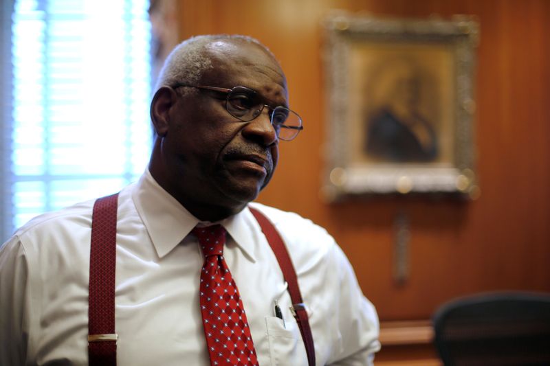 &copy; Reuters. FILE PHOTO: U.S. Supreme Court Justice Clarence Thomas is seen in his chambers at the U.S. Supreme Court building in Washington, U.S. June 6, 2016.  REUTERS/Jonathan Ernst/File Photo