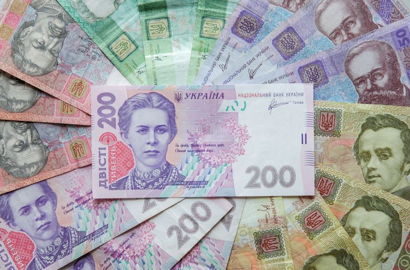 &copy; Reuters. FILE PHOTO: Ukrainian hryvnia banknotes are seen in a photo illustration shot in Kiev, Ukraine, August 6, 2014. REUTERS/Konstantin Chernichkin/Illustration