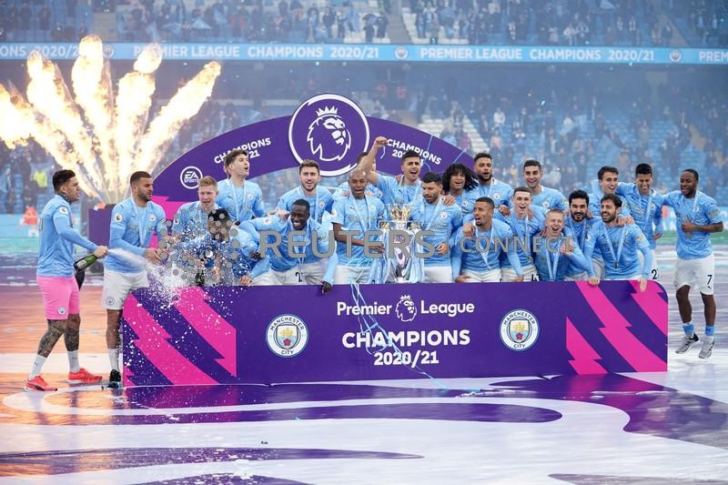 &copy; Reuters. Jogadores do Manchester City comemoram título da Premier League
23/05/2021
Pool via REUTERS/Dave Thompson