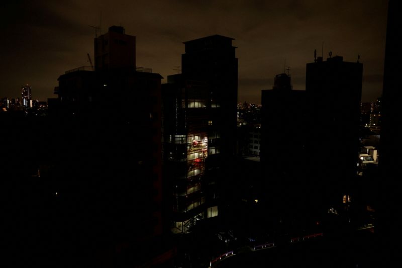 Japan turns down the heat and dims the lights to avoid power cut after quake