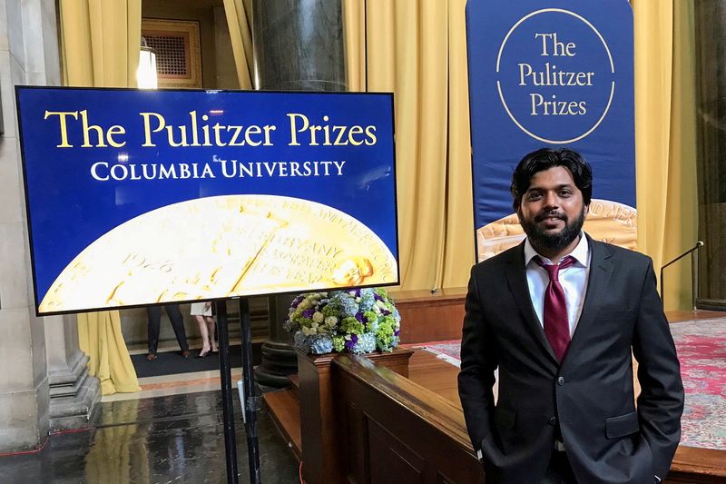 © Reuters. FILE PHOTO: Reuters photographer Danish Siddiqui, who was killed in Afghanistan last year, poses for a picture at Columbia University's Low Memorial Library during the Pulitzer Prize giving ceremony, in New York, U.S., May 30, 2018. Picture taken May 30, 2018. REUTERS/Mohammad Ponir Hossain/File Photo