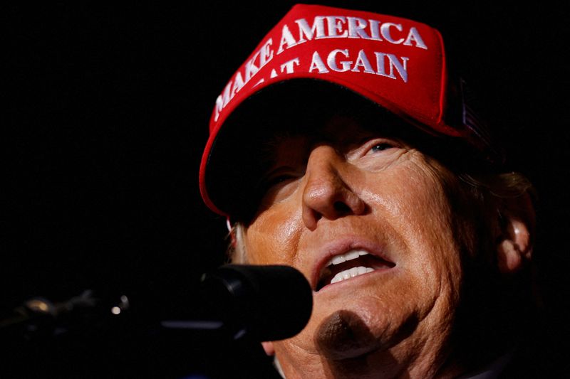 © Reuters. FILE PHOTO: Former U.S. President Donald Trump speaks during a rally at Florence Regional Airport in Florence, South Carolina, U.S., March 12, 2022. REUTERS/Randall Hill/File Photo