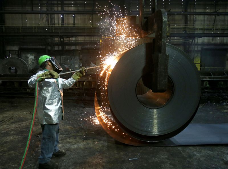 &copy; Reuters. FILE PHOTO: A worker cuts a piece from a steel coil at the Novolipetsk Steel PAO steel mill in Farrell, Pennsylvania, U.S., March 9, 2018. REUTERS/Aaron Josefczyk